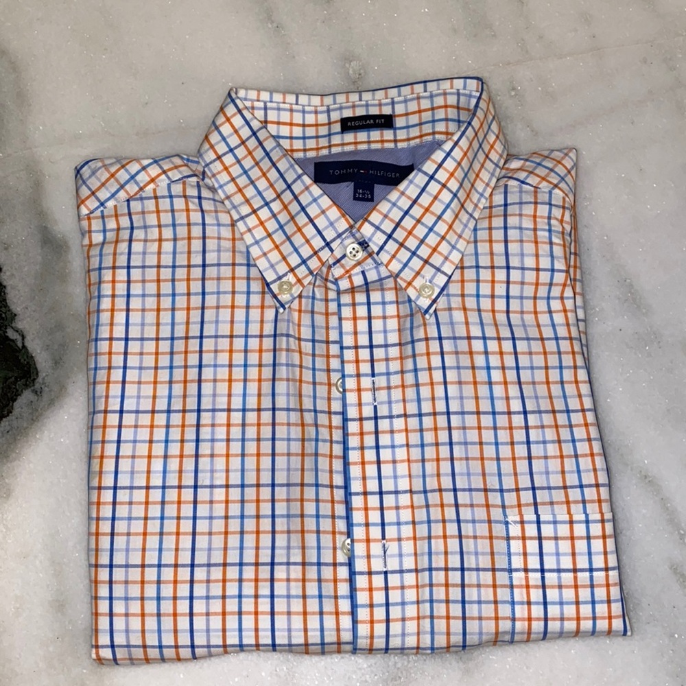 Tommy Hilfiger button down shirt. No tags but never been worn. Great condition